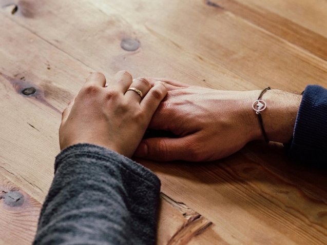 contact holding hands